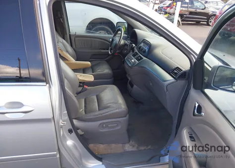 2010 Honda Odyssey Ex-L z USA, uszkodzony, nr VIN 5FNRL3H79AB039173